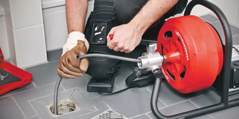 Drain cleaning service in Tucker, Georgia using professional plumbing equipment