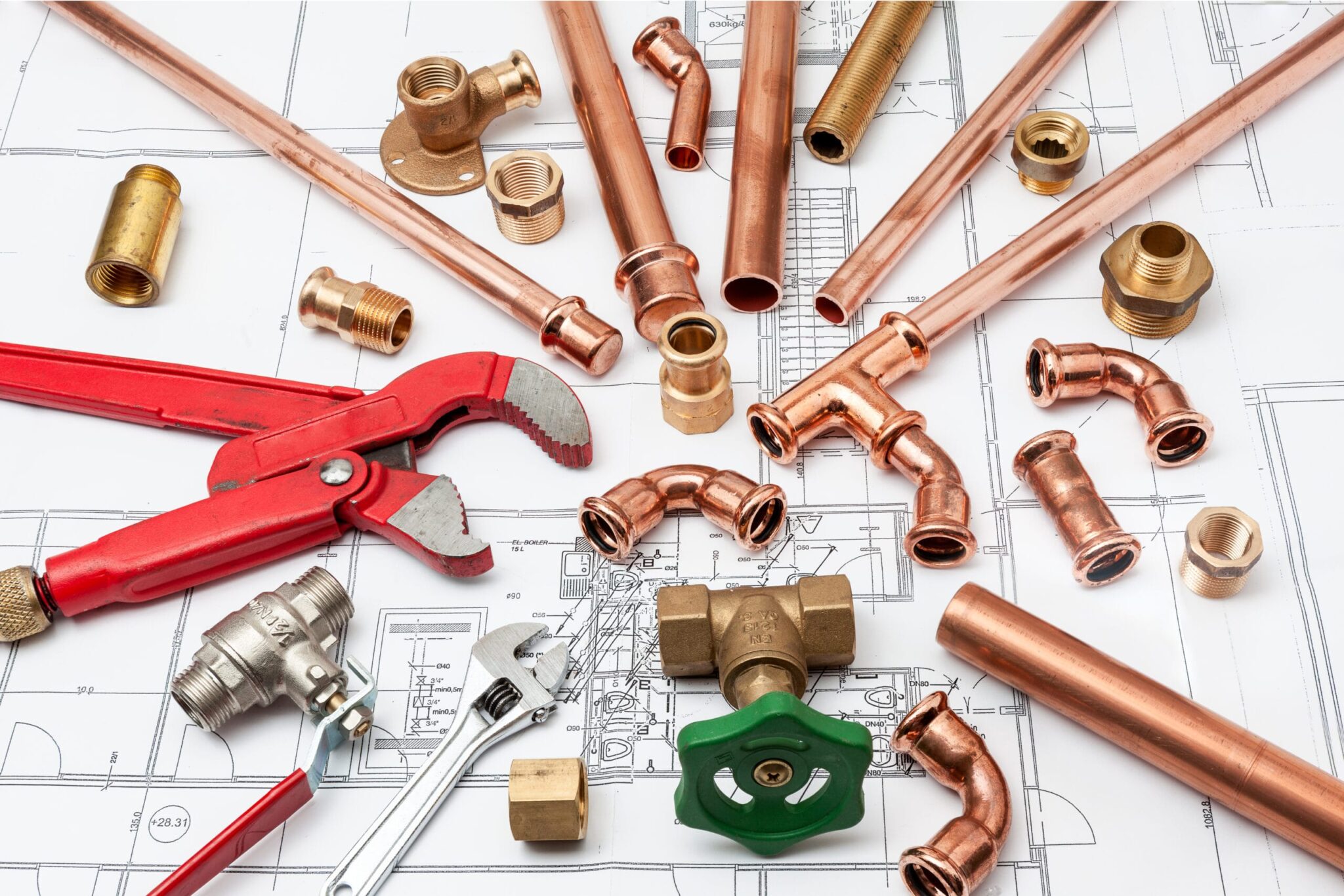 Copper pipes, fittings, valves, and plumbing tools in Tucker